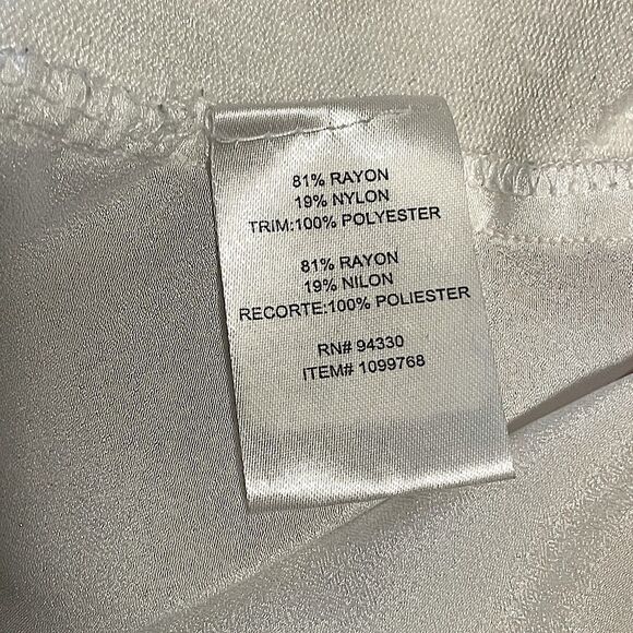 One A White Long Sleeve Top with Elongated Satin-like  Back. Size Medium. - Picture 3 of 4